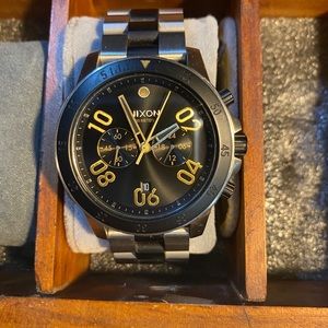 Nixon watch, black and gold